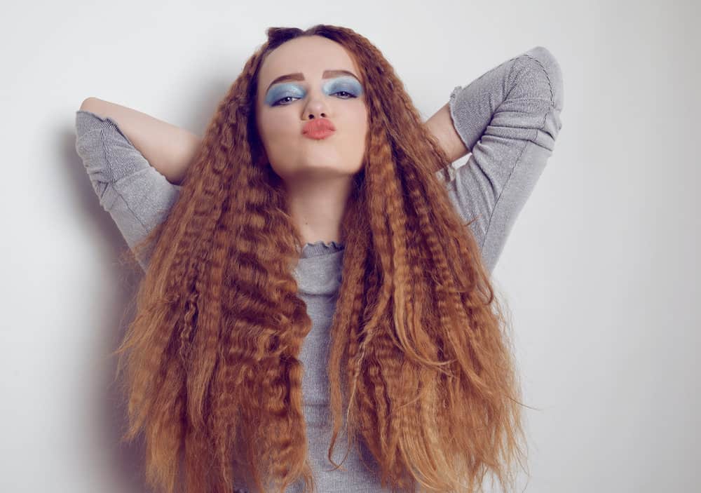 A stylish female followed a YouTube tutorial to achieve crimped hair on her 1C naturally straight hair.