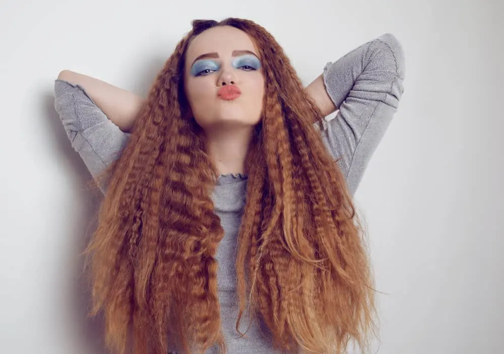 A stylish female followed a YouTube tutorial to achieve crimped hair on her 1C naturally straight hair. 
