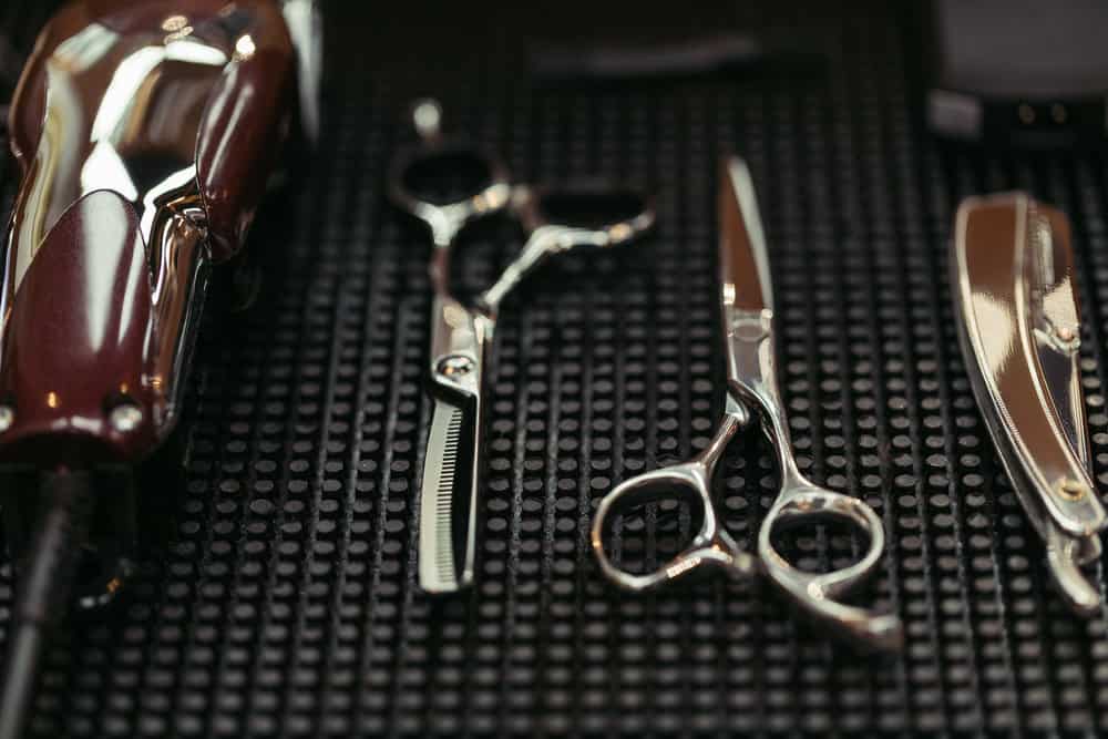 A comb blade, new pair of haircutting shears, a straight razor with a sharp edge, and my own clipper blades.