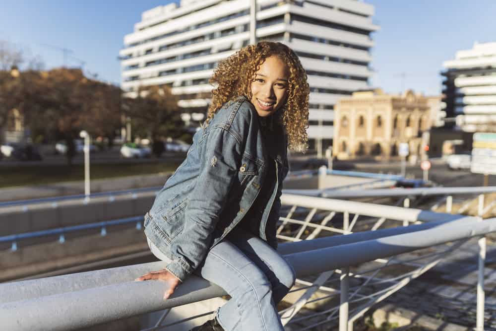 A light-skinned birthday girl is guaranteed to feel extra special on her birthday with this curly birthday hairstyle.