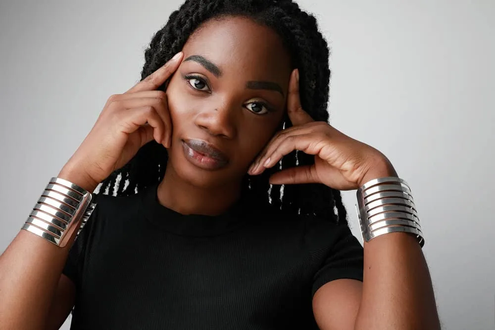 What Is Kente Oil? What Does Madea’s Kente Oil Smell Like? 1 A black girl with lovely dark skin, after using "kente oil", from Madea's videos and Facebook community.