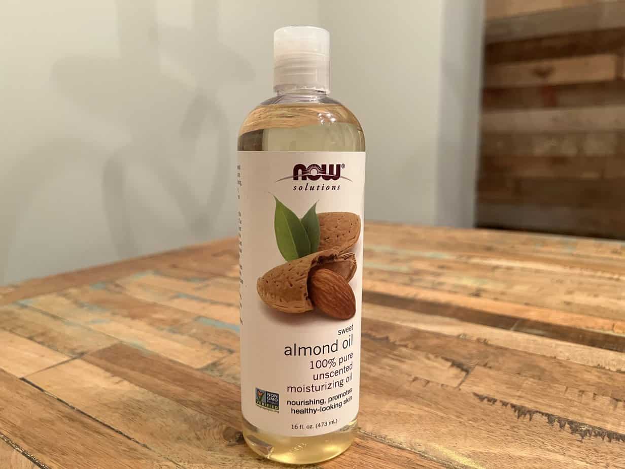 Now® Solutions Sweet Almond 100% pure unscented moisturizing oil for nourishing and promoting healthy hair.