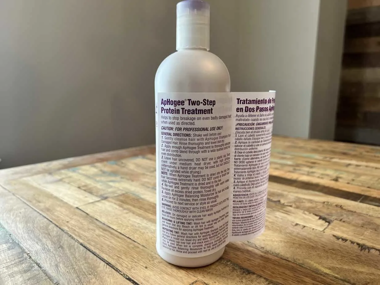 DIY Protein Treatment for Natural Hair at Home: Step-by-Step 8 General Directions: 1. Gently cleanse hair with ApHogee Shampoo for Damage Hair. Rinse thoroughly and towel blot dry. 2. Apply enough ApHogee Treatment to thoroughly saturate hair and comb blend through with a wide-toothed comb for even distribution. 3. Leave hair uncovered, DO NOT use a plastic cap. Sit under a medium heat dryer with high airflow. (Alternatively, a hand dryer may be used, but hair SHOULD NOT be agitated while drying. NOTE: When ApHogee Treatment is dried into the hair, the hair becomes extremely hard. DO NOT comb or brush hair while ApHogee Treatment is dried and in the hair. 4. Re-wet and gently rinse thoroughly with warm water. 5. Apply ApHogee Balancing Moisturizer to hair and scalp. Leave on for 2 minutes, then rinse thoroughly. 6. Proceed to the next service or style as usual.