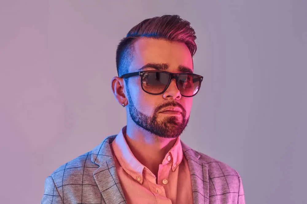15 Best French Crop Hairstyles and Haircuts for Men 16 Minimal styling is key for this man's wavy hair with a taper fade, creating a low-maintenance look that turns heads.
