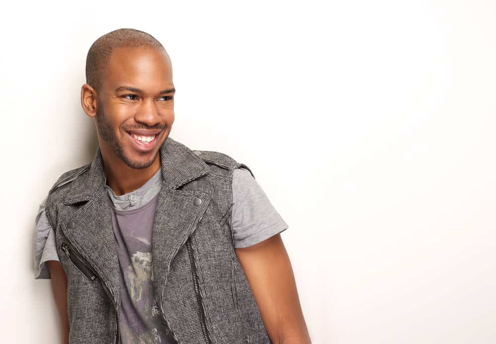 This African American man with fine hair is wearing a textured style that exudes style and confidence.