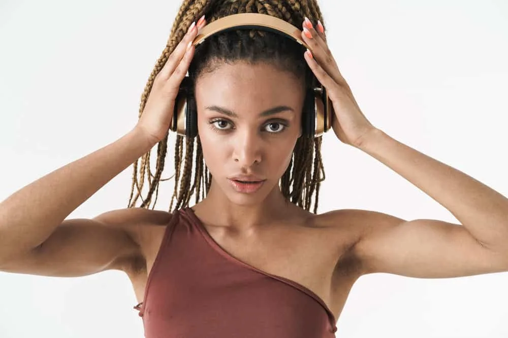 15 Crochet Hair Styles: Ways to Style Crochet Hair for Ladies 8 A light-skinned black girl looks stunning with her short crochet braids which is a gorgeous crochet hair style for her hair type.