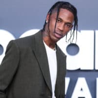American rapper Travis Scott wore his famous knotless Travis Scott braids, a popular look for rappers.