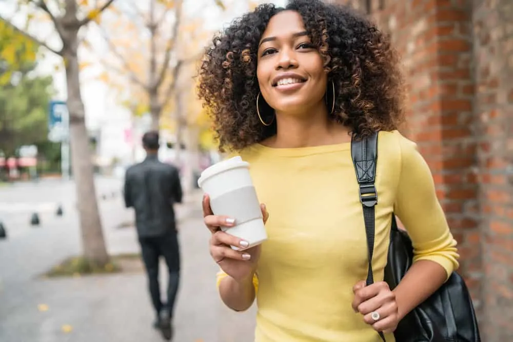 How to Deep Condition Hair at Home Naturally for Curly Hair 12 Light-skinned young black girl with chemically-treated low porosity hair styled with argan oil and a regular conditioner.