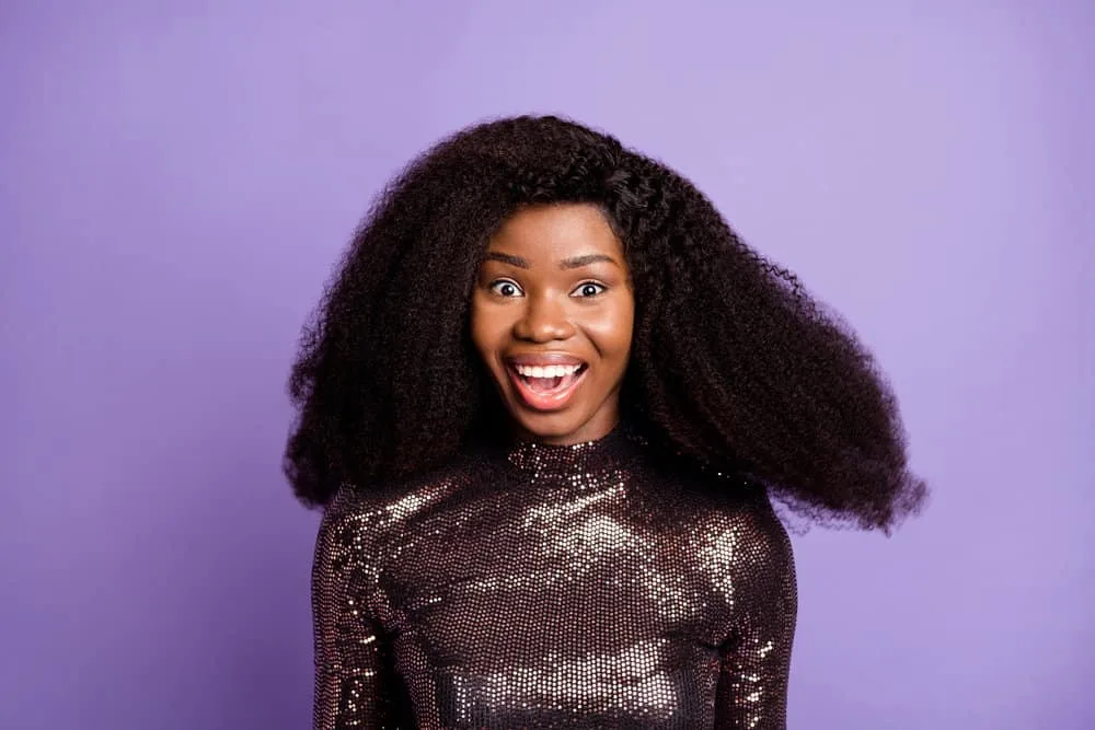What Is a Wig Closure? Lace Closure Wig vs. Lace Frontal Wig 8 A young black girl that often wears lace frontal wigs covering her own hair with multiple hairstyles with silk frontals.