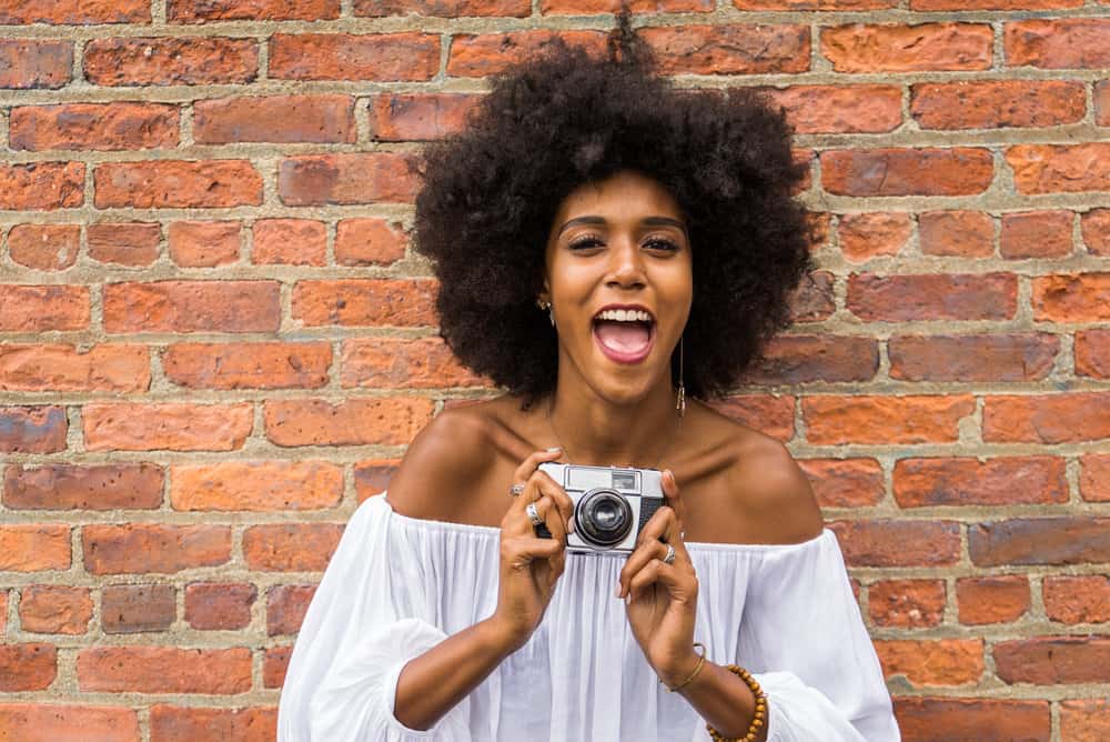 African American female with a 4B hair type has experienced healthy hair growth since starting her natural hair journey.