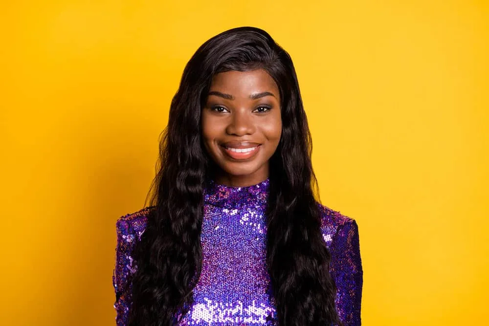 What Is a T-Part Wig? T-Part Wigs vs. Lace Frontal Wigs 4 A beginner-friendly flawless u-part wig worn by a woman of color blends perfectly with her pre-plucked hairline.