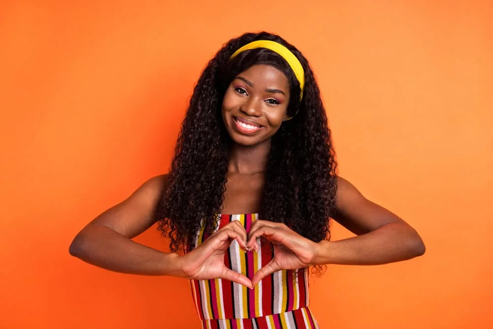 Is 150% Density Good for a Wig? How Thick Is a 150% Density Wig? 8 The lighter-density wig worn by this African American female is a full lace wig creating a natural and perfect look.