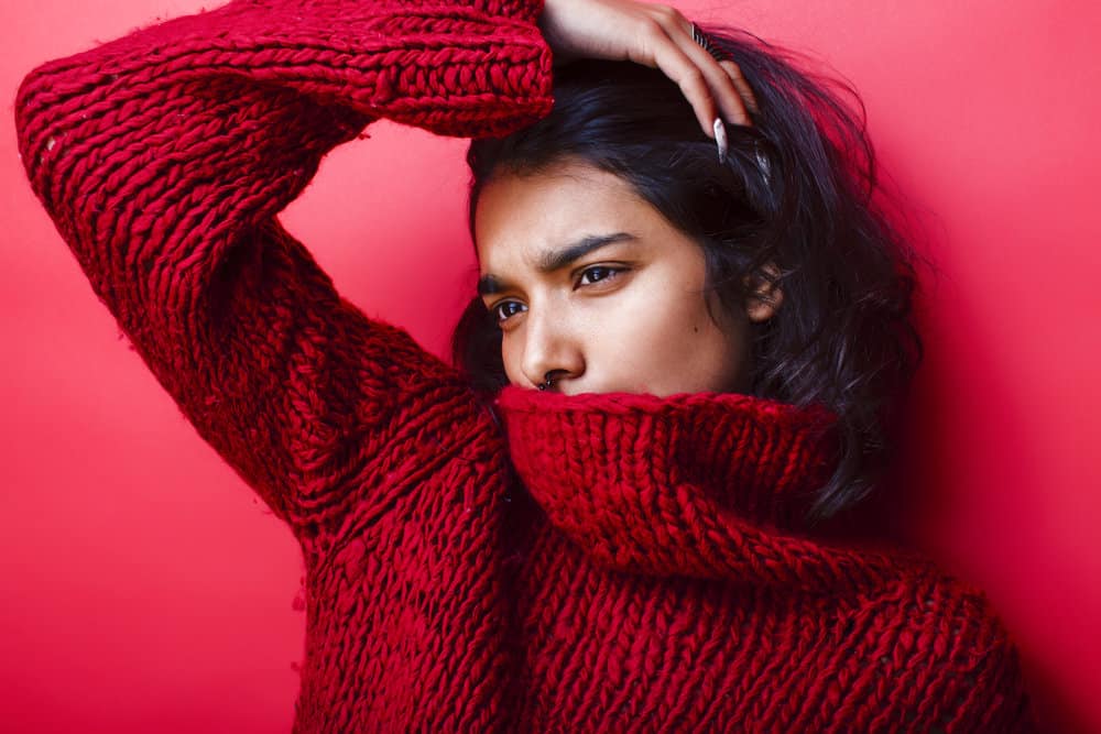 A woman with Indian thick hair used a commercial hair mask to boost hair growth and prevent hair fall.