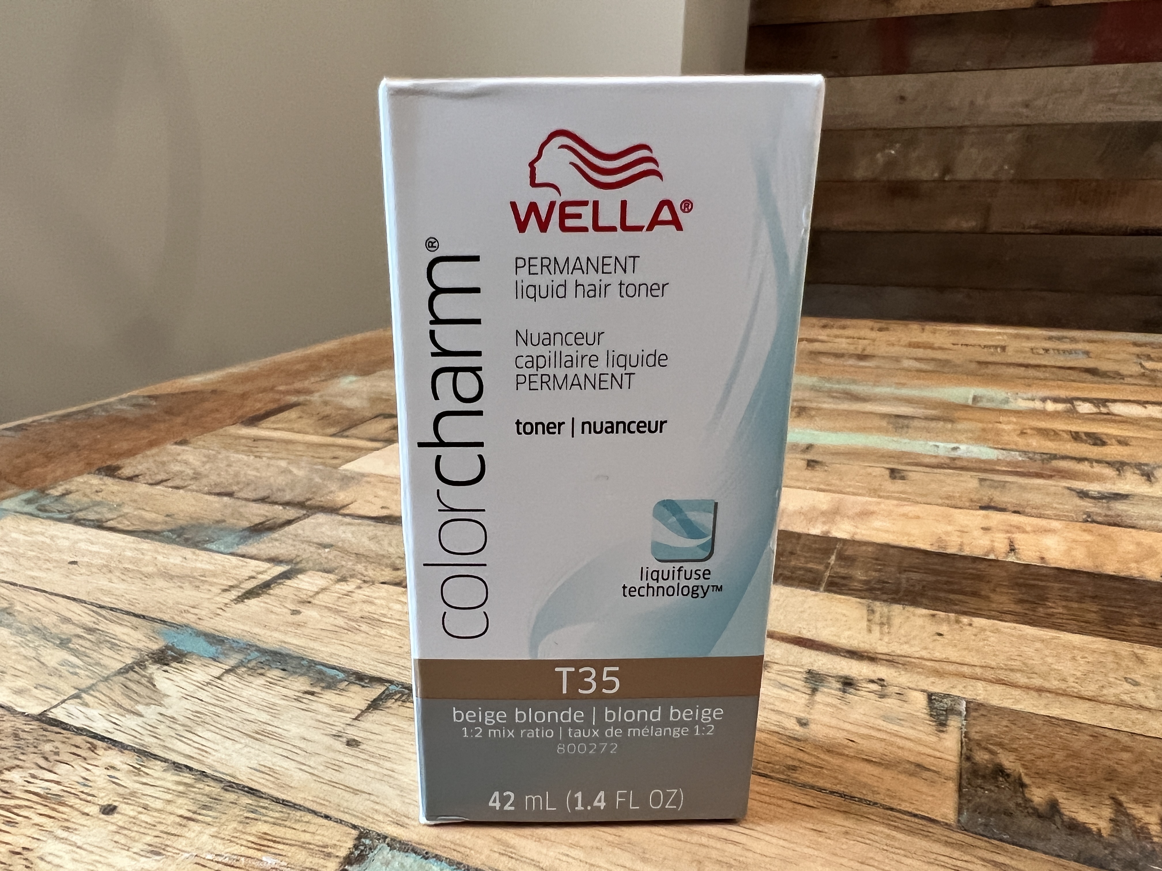 Wella T35 Beige Blonde Color Charm permanent liquid hair toner with liquifuse technology.