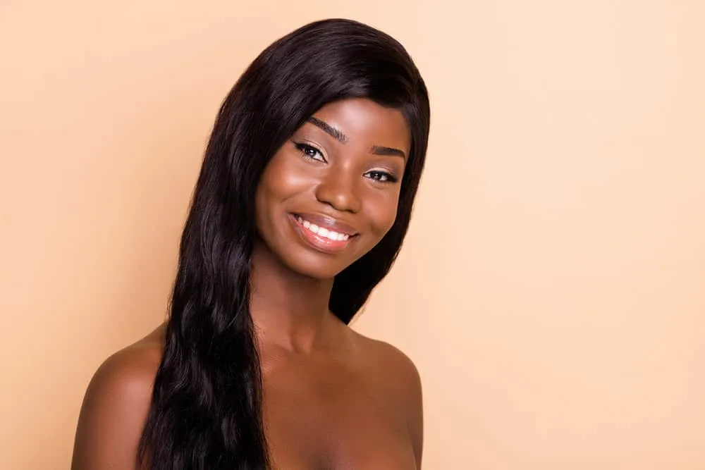 180 Wigs: What Does 180% Density Wig Mean? How's It Look? 3 A lovely female wearing a high-density wig made from thick hair follicles creates a natural appearance.