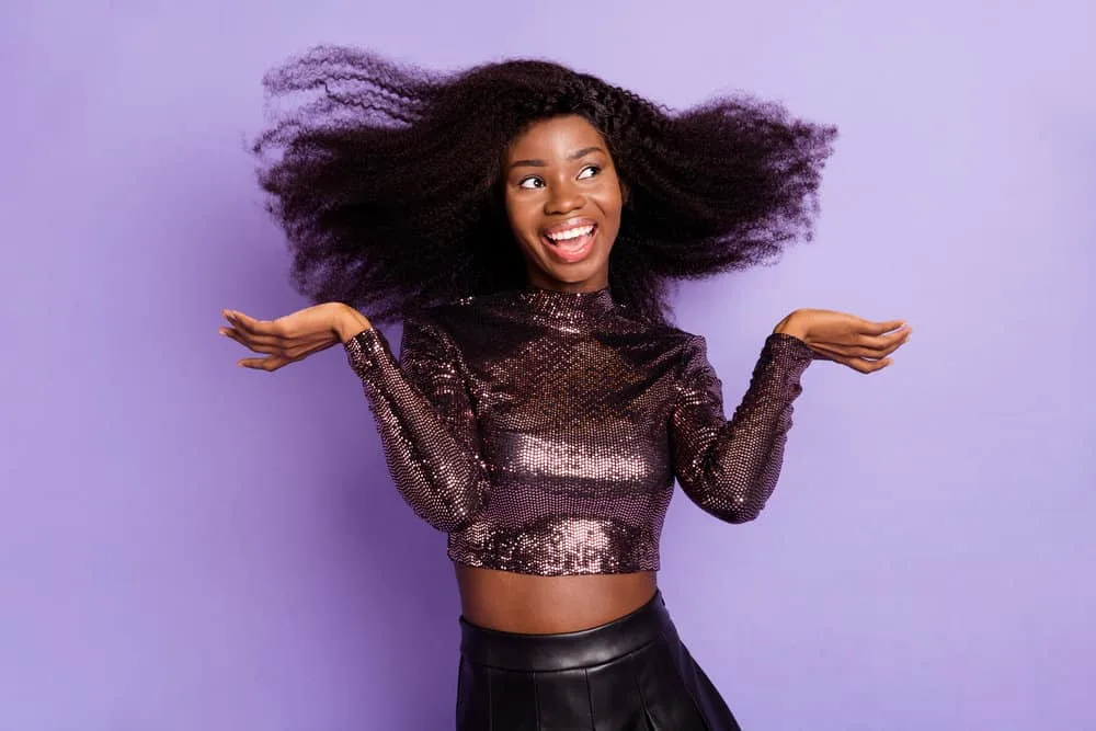 What Is a Wig Closure? Lace Closure Wig vs. Lace Frontal Wig 3 An adorable lady wearing a lace frontal closure creates a very natural look combined with hair extensions.