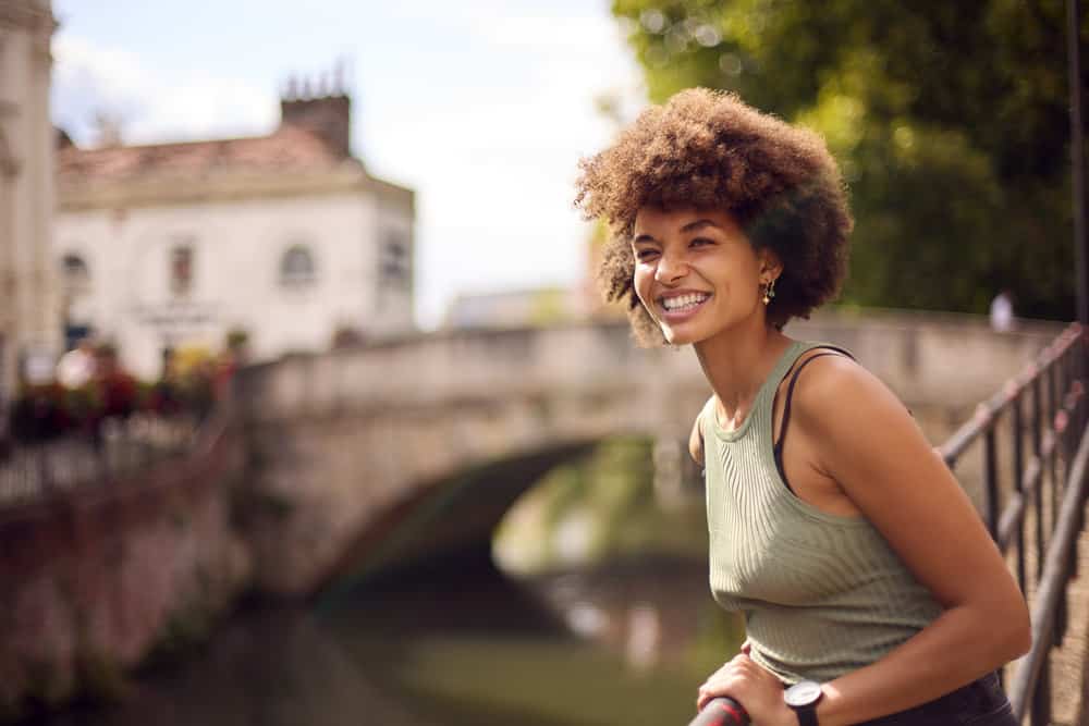 An African American woman received standardized scalp massage results after using the technique as a hair loss treatment.