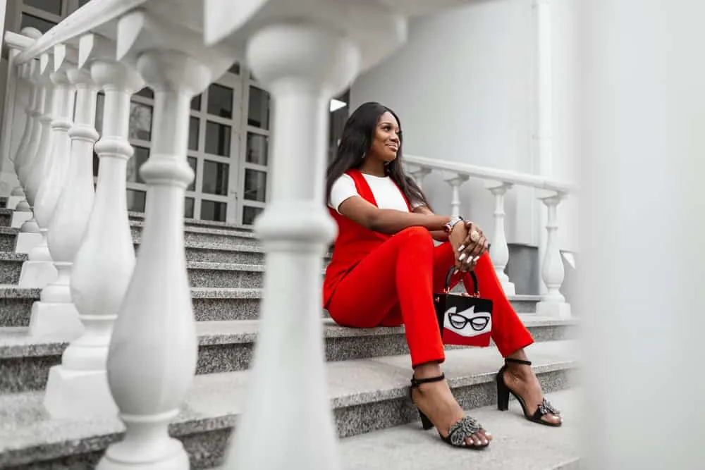 What Is a Melted Hairline Wig? How Long Do Melted Hairline Wigs Last? 7 A black female with a seamless hairline is wearing a fashionable outre melted hairline lace wig with a lift-free fit.