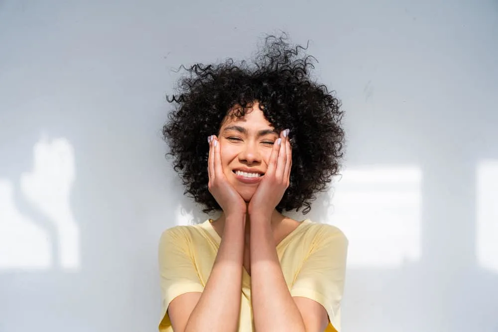 Does Rice Water Expire? Can You Use Old Rice Water? 8 African American female washed her hair with a boiled rice water treatment made with brown rice grains.