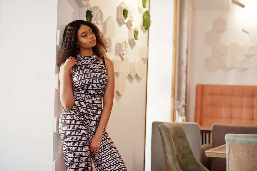 Best Wigs: Where to Buy Good Human Hair and Synthetic Wigs 15 A cute black girl wearing the best headband wig with black and brown hair colors.