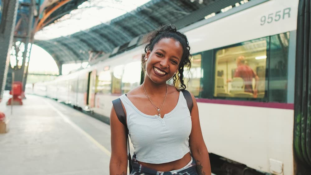 A beautiful black girl that suffered from hair thinning used a nail growth vitamin with folic acid for promoting hair growth.