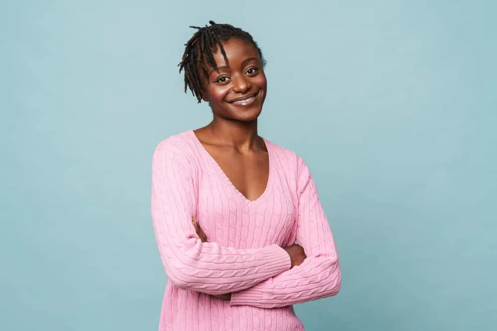 Starter Locs on 4C Hair: Starting Locs at Home Step-by-Step 3 A black female's fine hair is beautifully represented by the loc extensions on her very short hair that was recently styled with the palm roll method.
