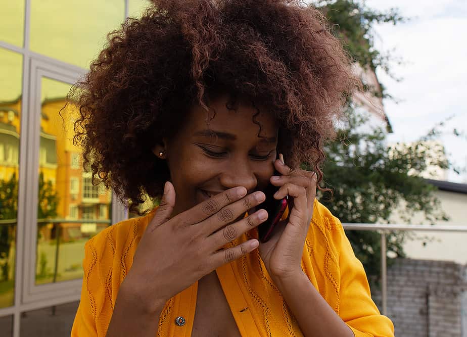 A black female with chemical damage on the cuticle layer of her hair.