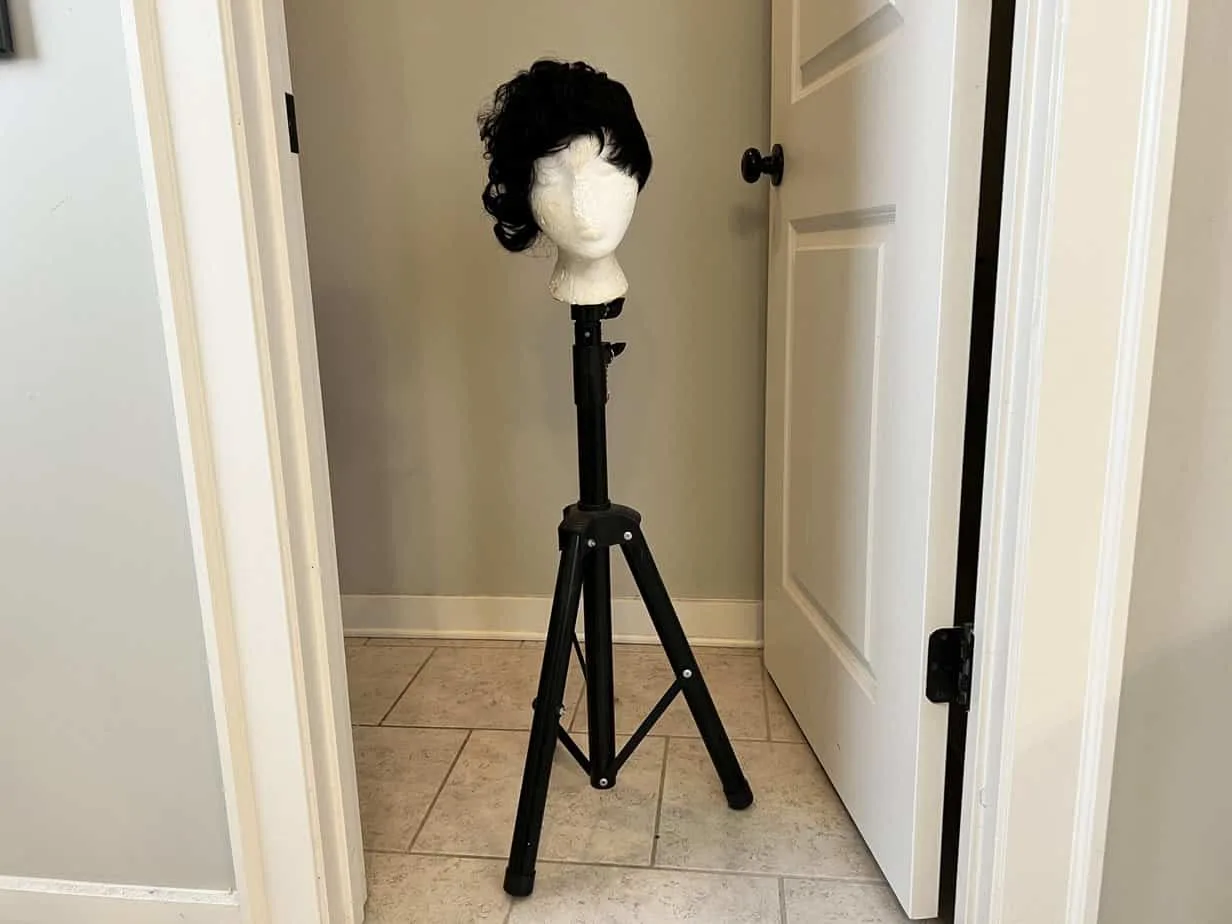 Here's another common setup that we use where the A1 Pacific female Styrofoam mannequin head still sits on a Hotkis human hair pixie cut wig while the foam head sits on a Klvied reinforced wig stand tripod.