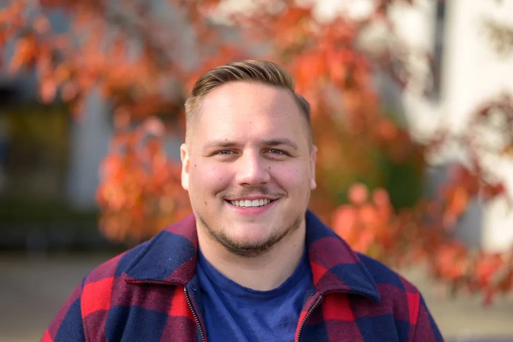 Best Haircuts for Men with Round Faces: Chubby Hairstyles for Guys 1 A young man with a round face shape has thinning facial hair and a high and tight fade, which is one of our favorite hairstyles for round faces.