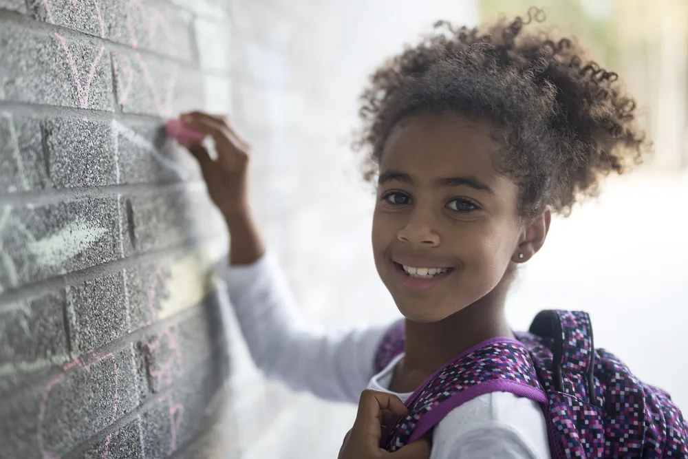 16 Easy 7 Year Old Black Girl Hairstyles: DIY for Little Girls 13 The little black girls mom created a cute and age-appropriate black hair style a high bun, which is one of the most common black toddler hairstyles with colorful beads.