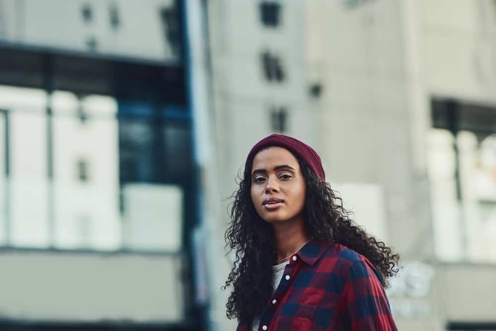 The black beauty's frizzy hair tells the tale of her styling adventures, as she used a blow dryer and frizz-control gel to tame her bouncy curls.