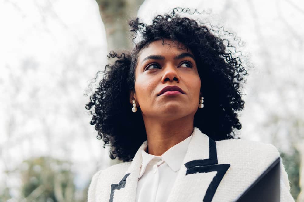 She knows the importance of combing her wet hair with a wide-toothed comb and gently scrunching to encourage her natural curls.