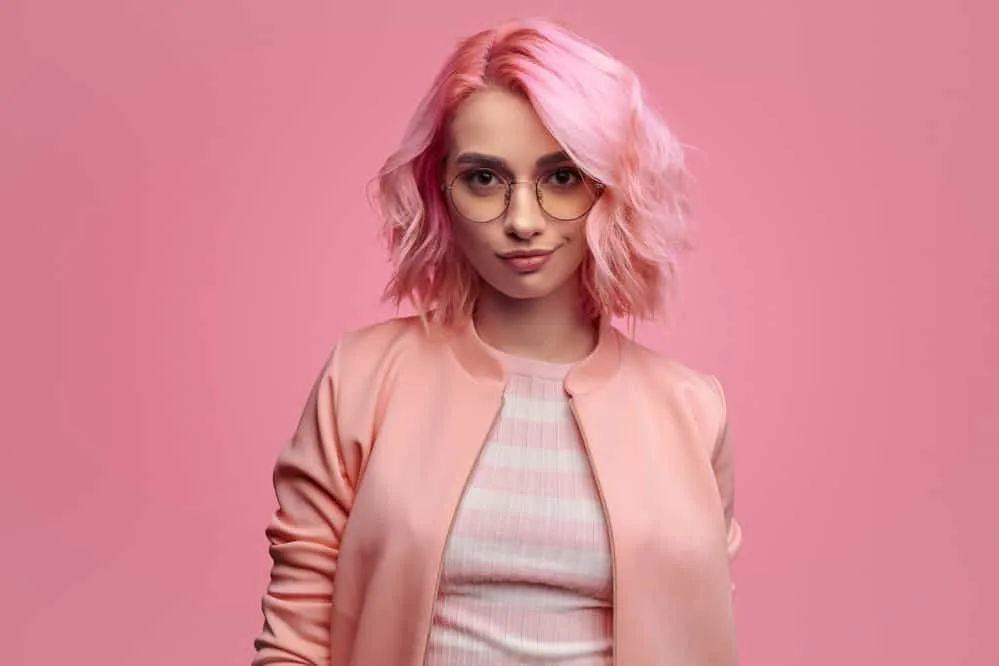 How to Use Wella T50 Toner Before and After: Wella Pink Blossom 6 This beautiful girl's color-treated hair has a perfect ash blonde tone after using Wella toner and purple shampoo to neutralize the warm and brassy hues.