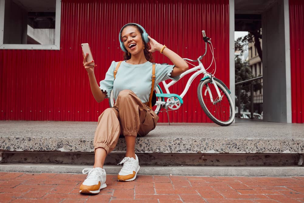 With a specific curl pattern, she uses essential oils like coconut oil or castor oil to keep her hair follicles healthy and promote curl definition.