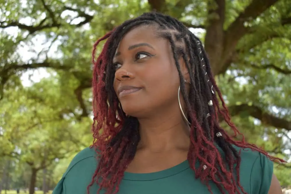 Butterfly Locs: How to Do Butterfly Loc Hairstyles at Home 9 The butterfly locs, created with separated water wave hair, showcase the perfect balance of curly loops and thickness for a stunning, distressed look.