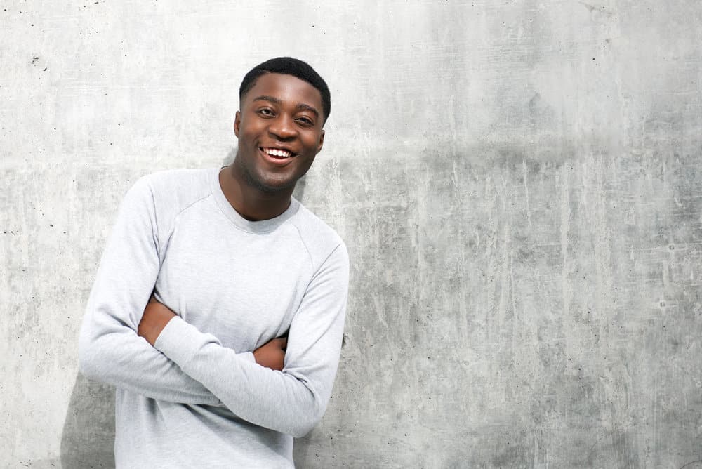 10 Different High Fade Haircuts for Black and White Guys 6 The high skin fade on his haircut creates a sharp and sleek look, highlighting his handsome face and perfect skin.