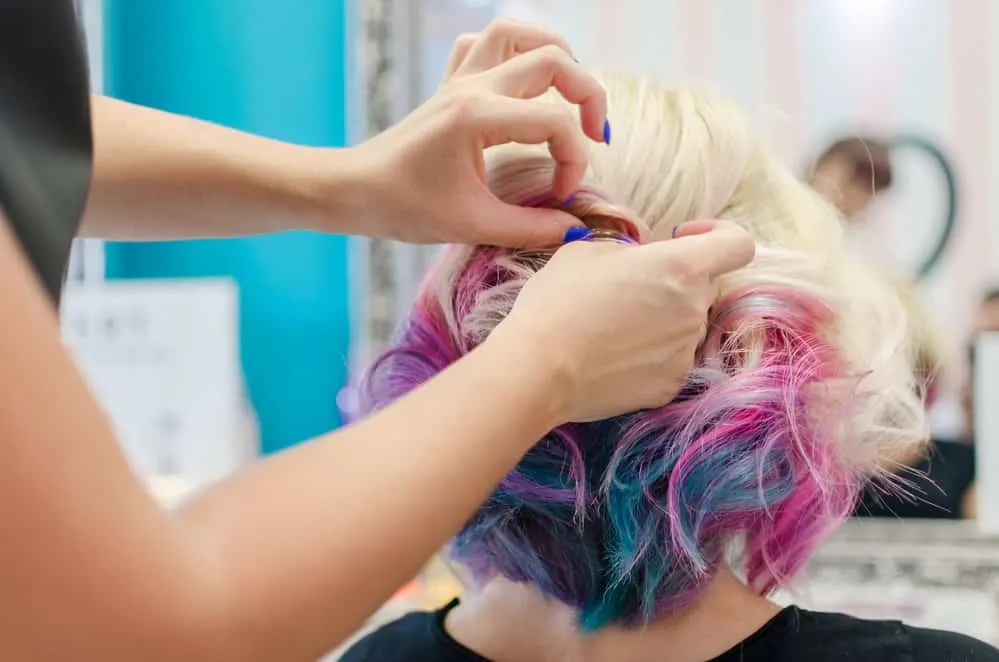 8 Underdye Hair Coloring Trends, Ideas, and Hairstyle Tips 4 With his perfectly styled Mexican mullet, he exudes confidence and embraces the unique and bold appearance it creates.