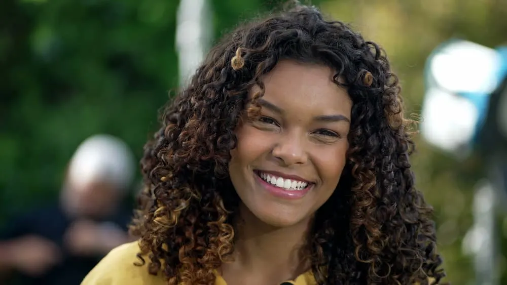 How to Dye Your Hair: Dye Hair at Home DIY Step-by-Step 7 A lady with black hair is now two shades lighter, giving her a fresh new look that she loves.