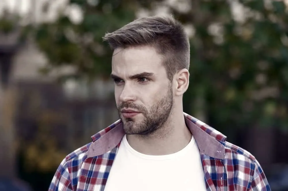 Hairstyles for Men with Big Foreheads: Step-by-Step Tutorials 27 His big forehead is an attractive feature that adds uniqueness to his overall appearance, making him stand out with confidence.