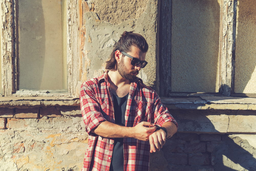 The guy's shaved sides further accentuate the uniqueness of his Mexican mullet, adding a touch of modernity to the overall style.