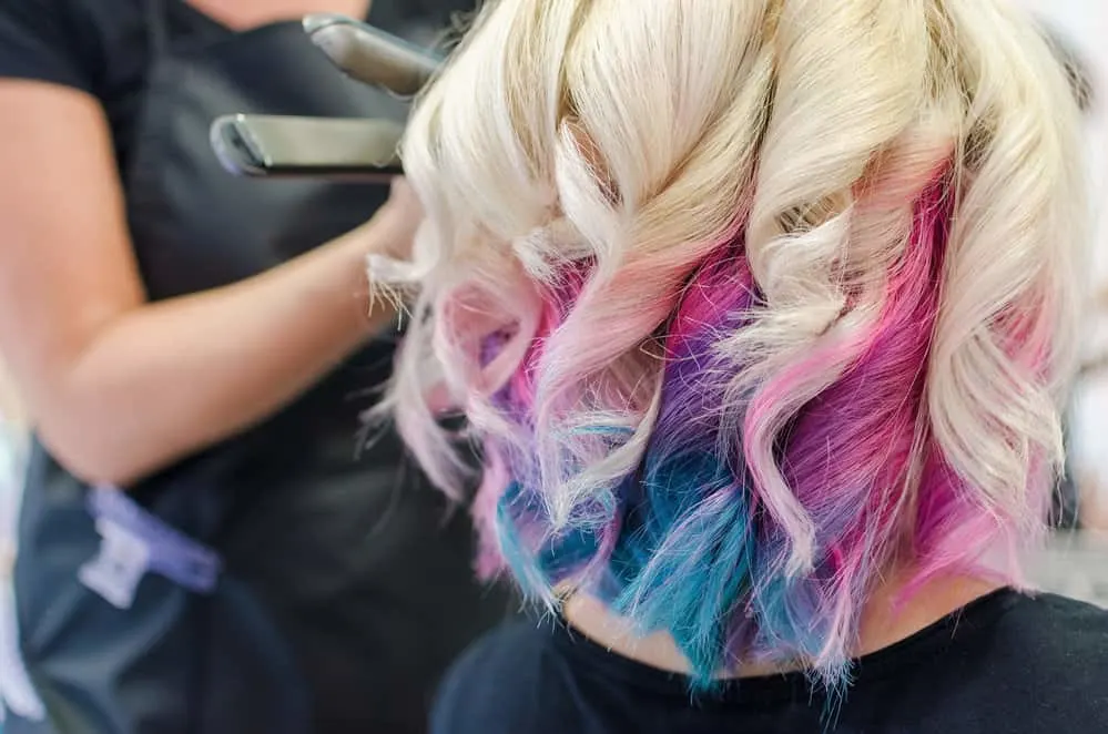 8 Underdye Hair Coloring Trends, Ideas, and Hairstyle Tips 14 With his caramel strawberry blonde peekaboo hair color, he effortlessly embraces the latest underdye hair trend, showcasing his fashion-forward style.