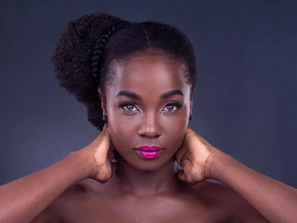 How to Seal Moisture in Hair: Moisturizing & Sealing Your Hair 5 The black girl's hair health thrives with a natural hair care routine featuring a moisturizing shampoo, leave-in conditioner, and protein treatment for optimal moisture retention.