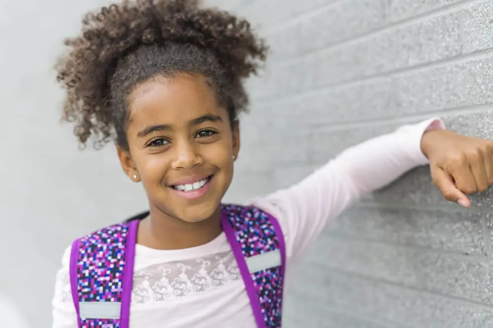 16 Easy 7 Year Old Black Girl Hairstyles: DIY for Little Girls 8 The little black girl's mom created one of our favorite cute hairstyles for her daughter using extensions, elevating her look with added length and volume.