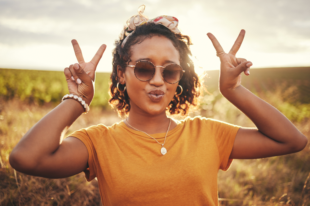 Understanding that the presence of fatty alcohols in her hair sprays and styling products can help combat frizz and protect her hair strands.