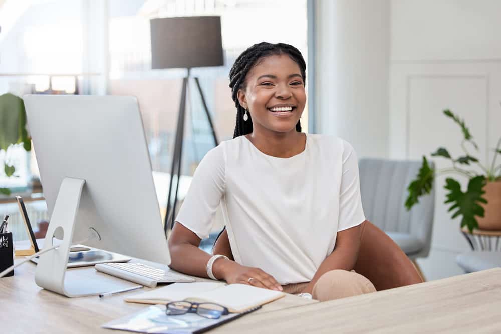 Her normal box braids provide a protective style that showcases her hair's natural beauty and allows for easy maintenance with tight tension.