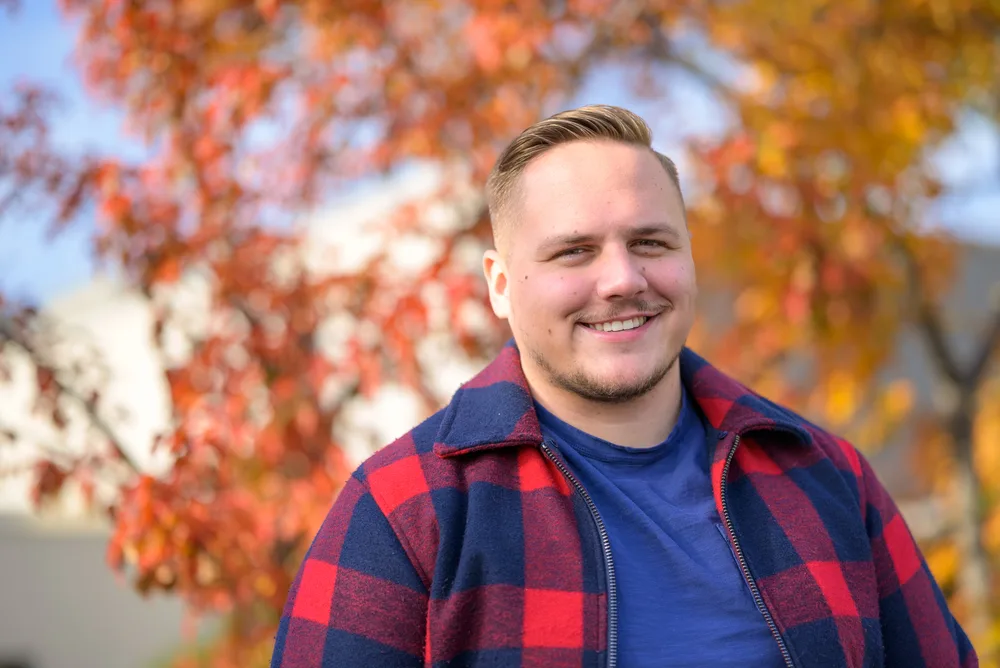Best Haircuts for Men with Round Faces: Chubby Hairstyles for Guys 3 The young man with a round face shape rocks a high and tight fade, one of our favorite hairstyles that complements his facial structure.