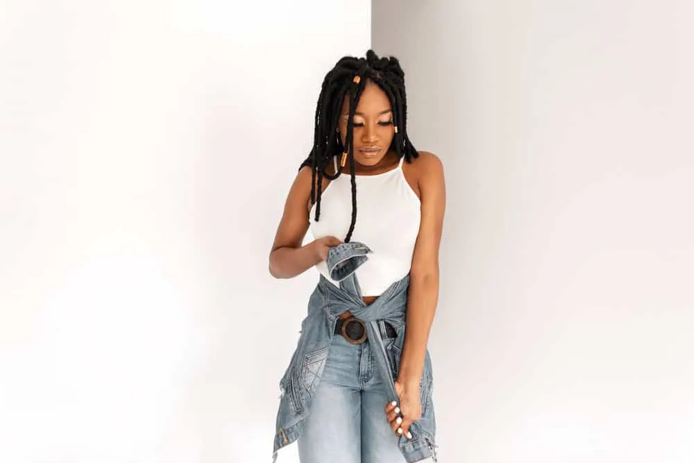 How to Take out Soft Locs: An Easy Way to Remove Soft Locs 3 This fashionable black lady's crochet faux locs, made with Kanekalon hair, create a stunning natural hairstyle that highlights her beautiful face.