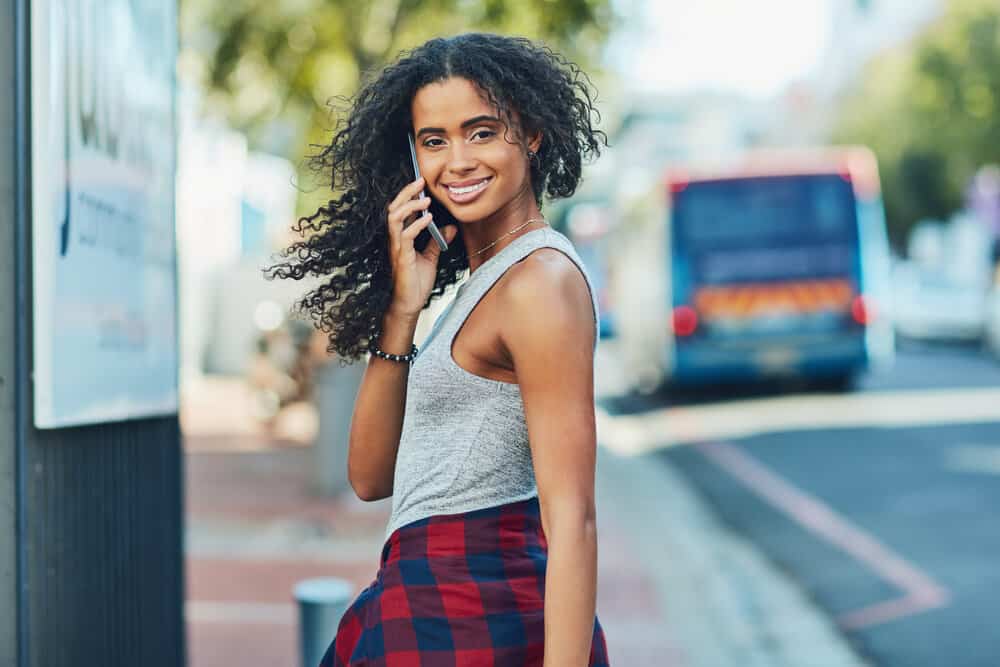 The black beauty's wavy hair, though naturally stunning, is currently plagued by frizz caused by the blow dryer and frizz-control gel.