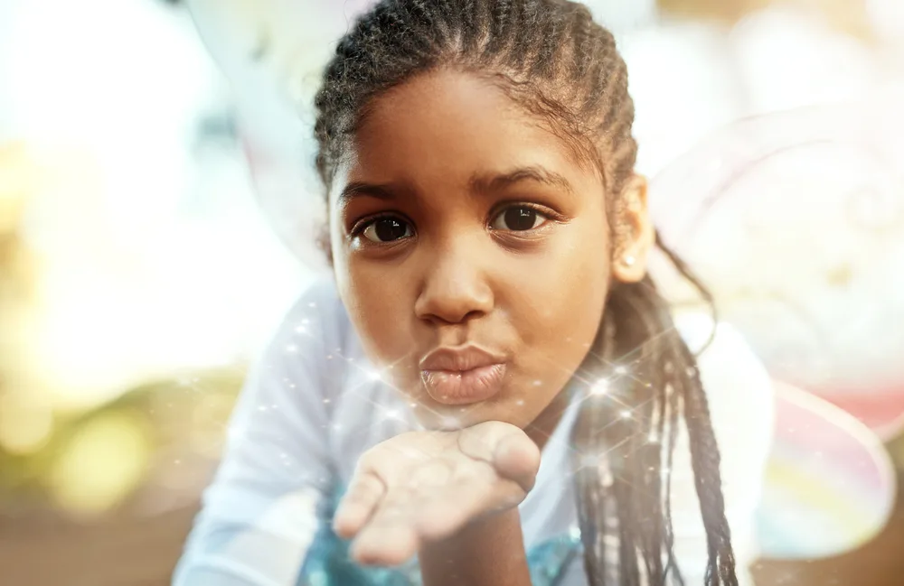 Box Braids for Kids: Do Kids Box Braids Hairstyles at Home 9 The little girl after removing her cute pink braided space buns, added a touch of whimsy to her crochet box braids.