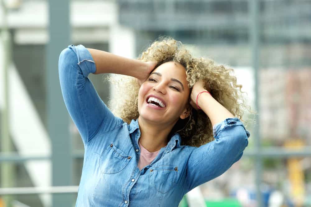 The pale yellow shade achieved on her virgin hair showcases the efficacy of the bleach treatment and the expertise of her colorist.